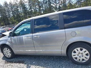 2016 Dodge Grand Caravan SE with VIN 2C4RDGBGXGR220549, listed as a IAAI auction lot 42074110 with 114,826 mi miles and . Bid and sale history available at DreamBid. Image 15.