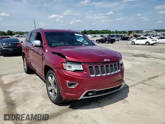 2015 Jeep Grand Cherokee Overland with VIN 1C4RJECG3FC686536, listed as a Copart auction lot 61058215 with 132,282 mi miles and Salvage title. Bid and sale history available at DreamBid. Image 13.