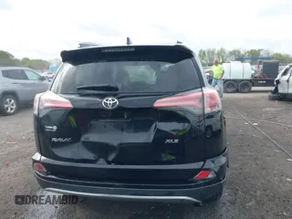 2018 Toyota RAV4 XLE with VIN 2T3WFREV9JW412755, listed as a IAAI auction lot 41889960 with 216,451 mi miles and . Bid and sale history available at carsss.com. Image 16.