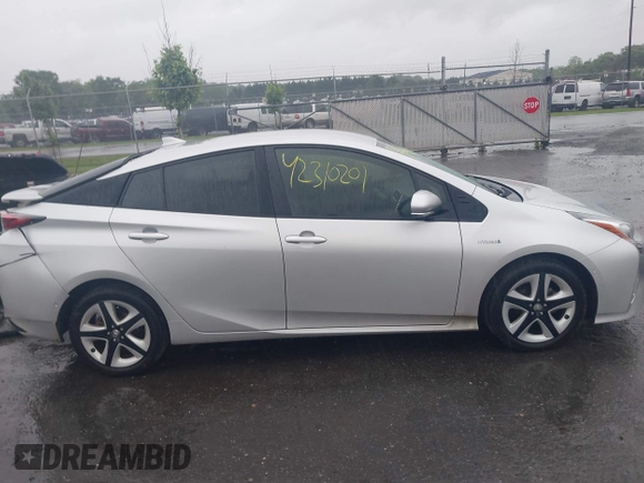 2017 Toyota Prius Two with VIN JTDKARFU4H3043433, listed as a IAAI auction lot 42310201 with 50,715 mi miles and . Bid and sale history available at DreamBid. Image 13.