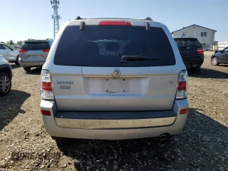 2008 Mercury Mariner с VIN 4M2CU81128KJ48913, выставлен на аукционе Copart как лот 61588355 с пробегом 84 883 миль миль и Списание • Salvage title. История ставок и продаж доступна на DreamBid. Изображение 6.