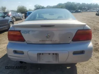 1997 Chrysler Sebring LXi z VIN 4C3AU52NXVE180034, wystawiony jako Copart lot #73413994 z przebiegiem 123 637 mil mil oraz Tytuł czysty. Historia ofert i sprzedaży dostępna na DreamBid. Obrazek 6.