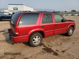 2000 Oldsmobile Bravada z VIN 1GHDT13W6Y2308007, wystawiony jako Copart lot #63862394 z przebiegiem 142 617 mil mil oraz Szkody całkowita. Historia ofert i sprzedaży dostępna na DreamBid. Obrazek 3.