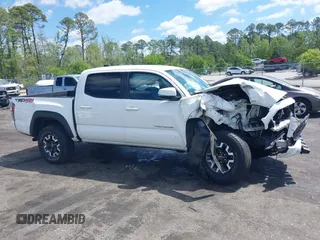 2020 Toyota Tacoma SR5 z VIN 5TFCZ5AN5LX231157, wystawiony jako IAAI lot #42045534 z przebiegiem 84 099 mil mil oraz . Historia ofert i sprzedaży dostępna na DreamBid. Obrazek 13.