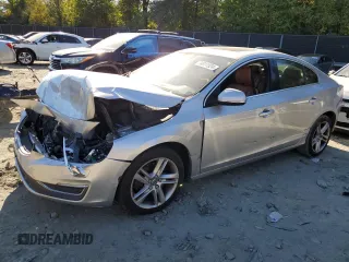 2015 Volvo S60 T5 Platinum with VIN YV1612TM8F1357277, listed as a Copart auction lot 74011524 with 142,092 mi miles and Non Repairable. Bid and sale history available at carsss.com. Image 1.