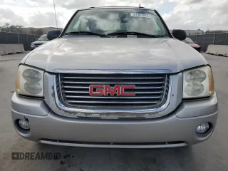 2006 GMC Envoy SLT with VIN 1GKDS13S662139632, listed as a Copart auction lot 47387245 with 246,803 mi miles and Salvage Title. Bid and sale history available at carsss.com. Image 5.