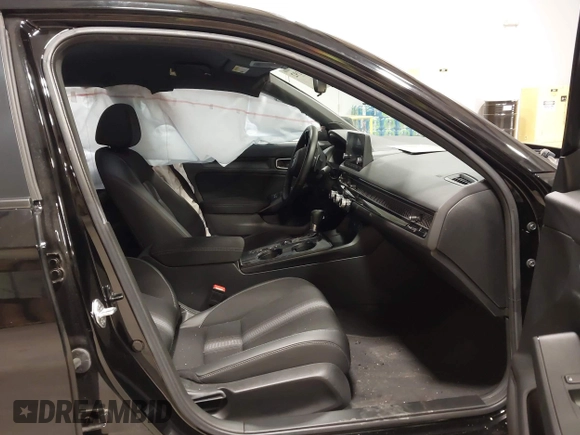 2024 Honda Civic Sport with VIN 2HGFE2F59RH519889, listed as a IAAI auction lot 41598192 with 7,451 mi miles and . Bid and sale history available at DreamBid. Image 5.