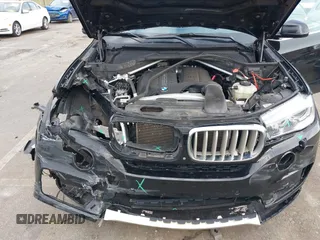 2016 BMW X5 sDrive35i with VIN 5UXKR2C59G0U17661, listed as a IAAI auction lot 40931088 with 90,963 mi miles. Bid and sale history available at carsss.com. Image 10.