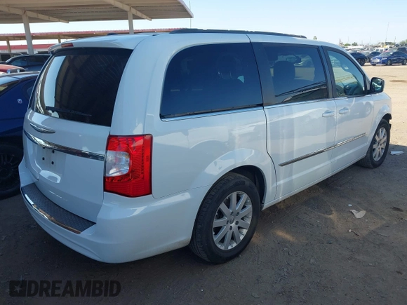 2014 Chrysler Town & Country Touring with VIN 2C4RC1BG8ER434940, listed as a IAAI auction lot 42483562 with 162,625 mi miles and . Bid and sale history available at DreamBid. Image 4.