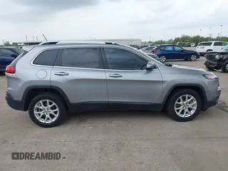 2016 Jeep Cherokee 75th Anniversary with VIN 1C4PJLCB1GW229823, listed as a IAAI auction lot 41848844 with 94,884 mi miles. Bid and sale history available at carsss.com. Image 13.