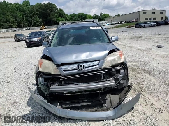 2007 Honda CR-V EX-L z VIN JHLRE38797C082267, wystawiony jako Copart lot #57602825 z przebiegiem 160 217 mil mil oraz Szkoda całkowita • Salvage title. Historia ofert i sprzedaży dostępna na DreamBid. Obrazek 14.