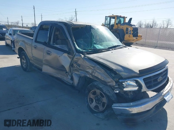2002 Ford F-150 XLT with VIN 1FTRW07672KB31448, listed as a IAAI auction lot 41226836 with 265,234 mi miles. Bid and sale history available at carsss.com. Image 1.