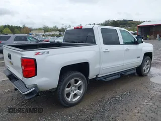2016 Chevrolet Silverado 1500 LT with VIN 3GCUKREC0GG136136, listed as a IAAI auction lot 41971199 with 179,045 mi miles and . Bid and sale history available at DreamBid. Image 4.