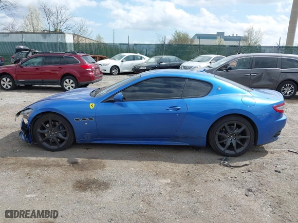 2013 Maserati GranTurismo Sport with VIN ZAM45VLA7D0073503, listed as a IAAI auction lot 41921102 with 53,436 mi miles. Bid and sale history available at carsss.com. Image 14.