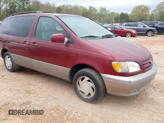 2002 Toyota Sienna LE with VIN 4T3ZF13C12U437425, listed as a IAAI auction lot 41157987 with 200,309 mi miles. Bid and sale history available at carsss.com. Image 1.