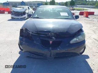 2007 Pontiac Grand Prix z VIN 2G2WP552171124777, wystawiony jako IAAI lot #42301446 z przebiegiem 208 607 mil mil oraz . Historia ofert i sprzedaży dostępna na DreamBid. Obrazek 13.