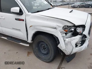 2019 Toyota Tacoma SR z VIN 3TMCZ5AN4KM220154, wystawiony jako IAAI lot #41602065 z przebiegiem 92 345 mil mil oraz . Historia ofert i sprzedaży dostępna na DreamBid. Obrazek 6.
