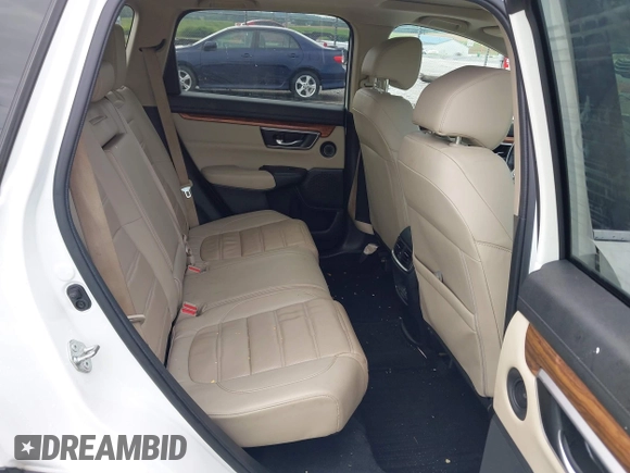 2018 Honda CR-V Touring with VIN 2HKRW2H91JH665241, listed as a IAAI auction lot 42638694 with 62,066 mi miles and . Bid and sale history available at DreamBid. Image 8.