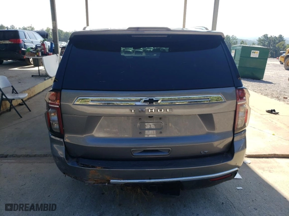 2021 Chevrolet Tahoe LT with VIN 1GNSCNKD3MR128657, listed as a Copart auction lot 69005834 with 90,899 mi miles and Salvage Title. Bid and sale history available at carsss.com. Image 6.
