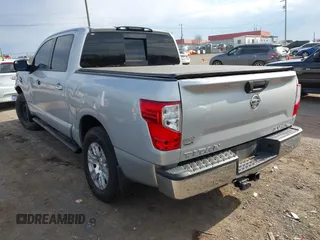 2017 Nissan Titan SV with VIN 1N6AA1EJ3HN538034, listed as a IAAI auction lot 41863785 with 204,198 mi miles and . Bid and sale history available at DreamBid. Image 3.