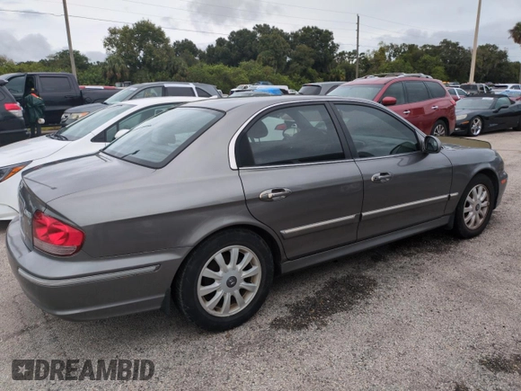 2003 Hyundai Sonata GLS with VIN KMHWF35HX3A866677, listed as a Copart auction lot 74620514 with 0 mi miles and Salvage Title. Bid and sale history available at carsss.com. Image 3.