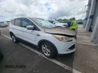 2014 Ford Escape SE z VIN 1FMCU0GX8EUC02813, wystawiony jako IAAI lot #42295739 z przebiegiem 69 094 mil mil oraz . Historia ofert i sprzedaży dostępna na DreamBid. Obrazek 1.