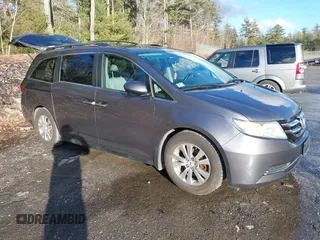 2014 Honda Odyssey EX-L z VIN 5FNRL5H67EB009341, wystawiony jako IAAI lot #41197966 z przebiegiem 172 631 mil mil oraz . Historia ofert i sprzedaży dostępna na DreamBid. Obrazek 1.