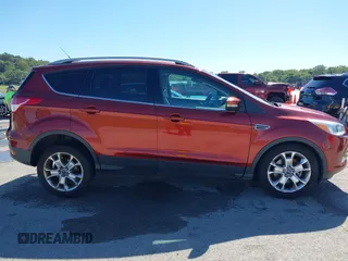 2015 Ford Escape Titanium with VIN 1FMCU9J92FUA53699, listed as a IAAI auction lot 40500310 with 197,581 mi miles. Bid and sale history available at carsss.com. Image 13.