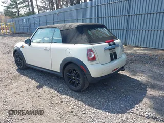 2013 MINI Convertible with VIN WMWZN3C58DT135598, listed as a IAAI auction lot 42122817 with 120,638 mi miles and . Bid and sale history available at DreamBid. Image 3.