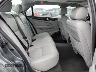 2006 Jaguar XJ with VIN SAJWA79B06SH07721, listed as a Copart auction lot 87851345 with 93,004 mi miles and Salvage Title. Bid and sale history available at carsss.com. Image 10.