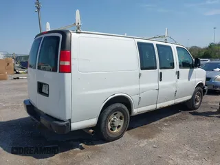 2012 Chevrolet Express Cargo Van with VIN 1GCWGFCA6C1147841, listed as a IAAI auction lot 42042056 with 248,374 mi miles. Bid and sale history available at carsss.com. Image 13.