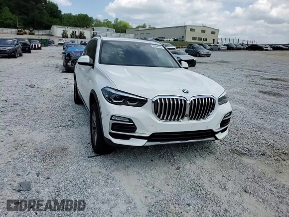 2021 BMW X5 xDrive40i z VIN 5UXCR6C07M9H21128, wystawiony jako Copart lot #54084915 z przebiegiem 26 966 mil mil oraz Szkody całkowita. Historia ofert i sprzedaży dostępna na DreamBid. Obrazek 14.