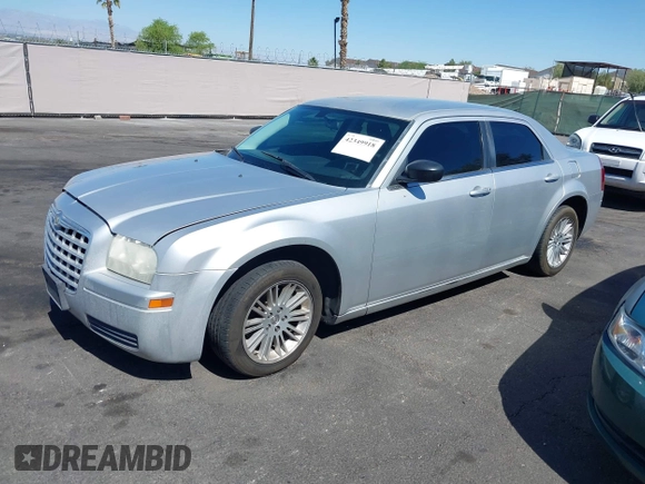 2009 Chrysler 300 LX z VIN 2C3KA43D89H612696, wystawiony jako IAAI lot #42349918 z przebiegiem 146 951 mil mil oraz . Historia ofert i sprzedaży dostępna na DreamBid. Obrazek 2.