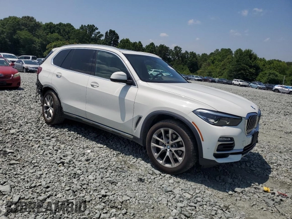 2019 BMW X5 xDrive40i with VIN 5UXCR6C5XKLL61071, listed as a Copart auction lot 60158945 with 67,631 mi miles and Salvage title. Bid and sale history available at DreamBid. Image 4.