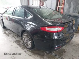 2013 Ford Fusion Titanium Hybrid with VIN 3FA6P0RU4DR281789, listed as a IAAI auction lot 41909115 with 161,008 mi miles and . Bid and sale history available at DreamBid. Image 3.