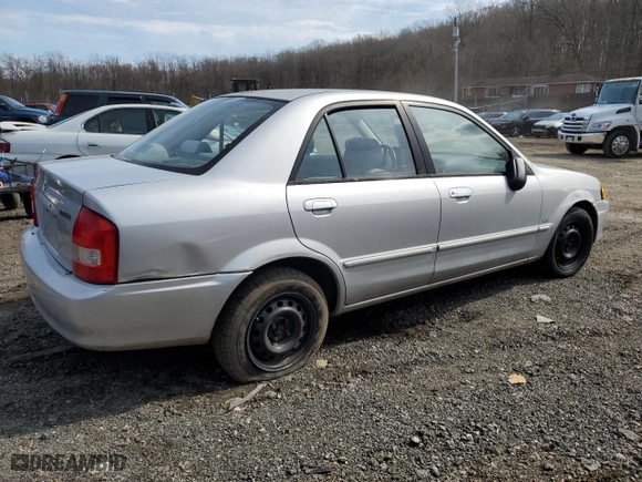 2000 Mazda Protege DX with VIN JM1BJ222XY0199683, listed as a Copart auction lot 50010565 with 139,428 mi miles and Salvage Title. Bid and sale history available at carsss.com. Image 3.