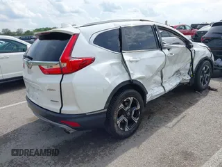 2018 Honda CR-V Touring with VIN 5J6RW2H99JL020598, listed as a IAAI auction lot 42104765 with 30,431 mi miles and . Bid and sale history available at carsss.com. Image 4.