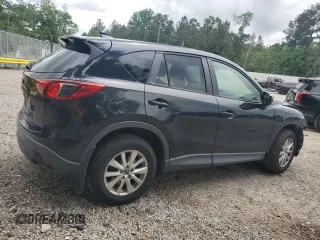 2016 Mazda CX-5 Touring with VIN JM3KE2CY9G0661308, listed as a Copart auction lot 51853485 with 131,595 mi miles and Salvage Title. Bid and sale history available at carsss.com. Image 3.