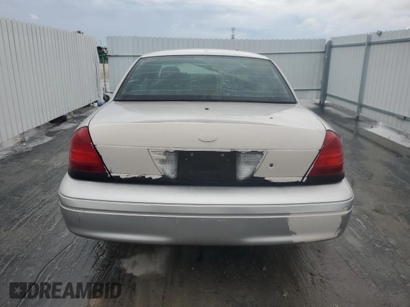 2011 Ford Police Interceptor with VIN 2FABP7BVXBX123711, listed as a Copart auction lot 46352595 with 151,597 mi miles and Clean title. Bid and sale history available at DreamBid. Image 6.