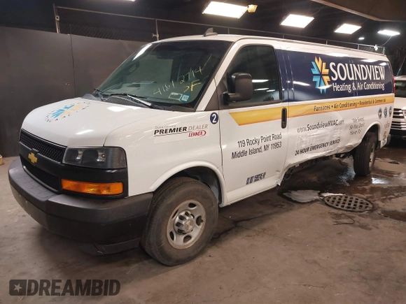 2020 Chevrolet Express Cargo Van with VIN 1GCWGBFB4L1205443, listed as a IAAI auction lot 41612714 with 87,883 mi miles. Bid and sale history available at carsss.com. Image 17.