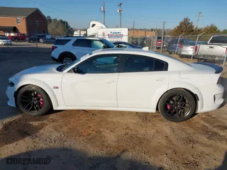 2020 Dodge Charger Scat Pack with VIN 2C3CDXGJ1LH217683, listed as a IAAI auction lot 41656722 with 70,758 mi miles. Bid and sale history available at carsss.com. Image 14.