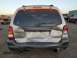 2002 Mazda Tribute LX with VIN 4F2YU09142KM22895, listed as a Copart auction lot 73797364 with 176,514 mi miles and Salvage Title. Bid and sale history available at carsss.com. Image 6.