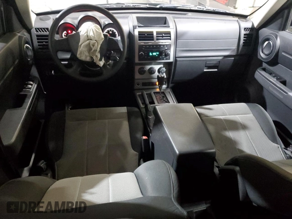 2009 Dodge Nitro SE с VIN 1D8GU28K89W531530, выставлен на аукционе Copart как лот 64177005 с пробегом 99 861 миль миль и Чистый • Clean title. История ставок и продаж доступна на DreamBid. Изображение 8.