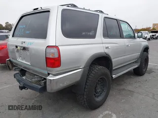 2000 Toyota 4Runner SR5 z VIN JT3HN86R9Y0288531, wystawiony jako IAAI lot #42157270 z przebiegiem 298 630 mil mil oraz . Historia ofert i sprzedaży dostępna na DreamBid. Obrazek 4.