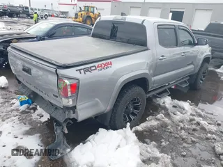 2021 Toyota Tacoma SR z VIN 3TMCZ5AN0MM386867, wystawiony jako IAAI lot #41580426 z przebiegiem 46 559 mil mil oraz . Historia ofert i sprzedaży dostępna na DreamBid. Obrazek 4.
