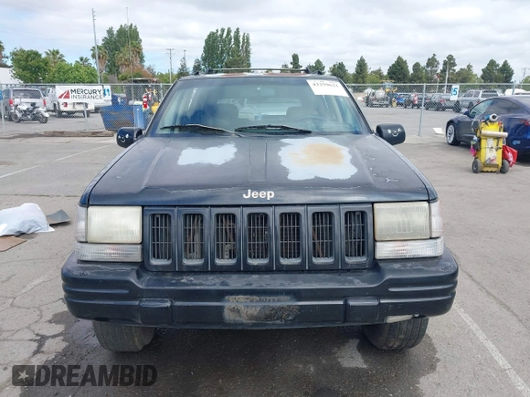 1996 Jeep Grand Cherokee Limited z VIN 1J4GZ78Y3TC191000, wystawiony jako IAAI lot #42259621 z przebiegiem 212 690 mil mil oraz . Historia ofert i sprzedaży dostępna na DreamBid. Obrazek 12.