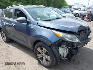 2013 Kia Sportage LX z VIN KNDPBCA20D7360053, wystawiony jako IAAI lot #42384555 z przebiegiem 173 746 mil mil oraz . Historia ofert i sprzedaży dostępna na DreamBid. Obrazek 1.