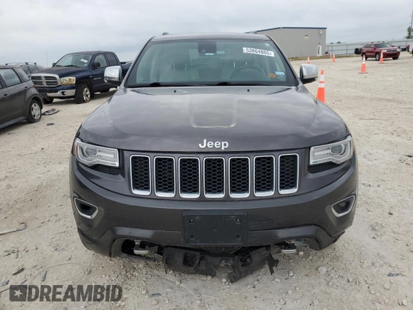 2014 Jeep Grand Cherokee Overland with VIN 1C4RJFCG9EC572237, listed as a Copart auction lot 53864865 with 90,657 mi miles and Salvage Title. Bid and sale history available at DreamBid. Image 5.