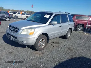 2005 Honda Pilot EX-L with VIN 5FNYF18615B001814, listed as a IAAI auction lot 42063992 with 258,923 mi miles and . Bid and sale history available at carsss.com. Image 2.
