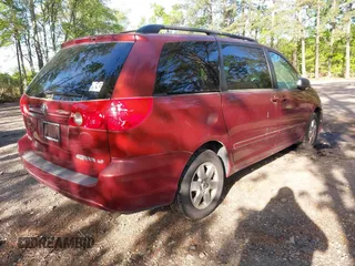 2010 Toyota Sienna CE with VIN 5TDKK4CC1AS299173, listed as a IAAI auction lot 42110416 with 239,548 mi miles. Bid and sale history available at carsss.com. Image 4.